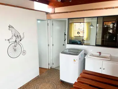 a room with a cat on a bike on the wall at San Miguel, 3 dormitorios, terraza wifi cochera in Lima