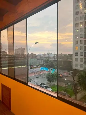 a view of a parking lot from a window at San Miguel, 3 dormitorios, terraza wifi cochera in Lima