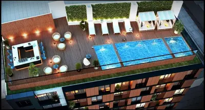 an overhead view of a building with a swimming pool at Moderno mini departamento de estreno in Lima