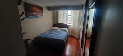 a small bed in a room with a window at HOSTAL SAMAYWASI in Huancayo