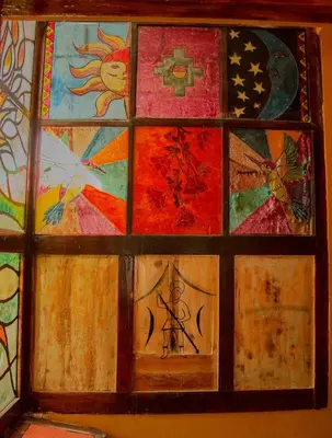 a stained glass window with many different colors at CASA HOSPEDAJE EL LABRADOR in Cusco