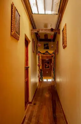 an empty hallway in a building with a skylight at CASA HOSPEDAJE EL LABRADOR in Cusco