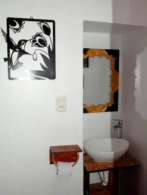 a bathroom with a sink and a mirror at CASA HOSPEDAJE EL LABRADOR in Cusco