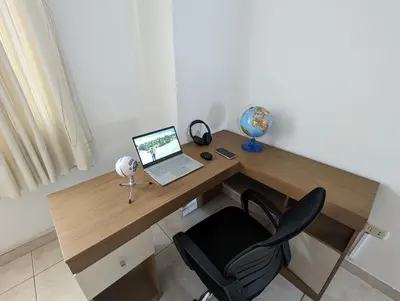 a desk with a laptop computer on top of it at Apartamento Privado, cerca al Centro Histórico de Lima in Lima