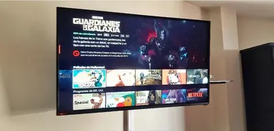 a flat screen tv hanging on a wall at Hospedaje Celerina & Elio in Lima