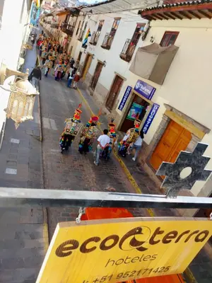 a group of motorcycles parked on a city street at Hotel Ecoterra Andino Cusco in Cusco
